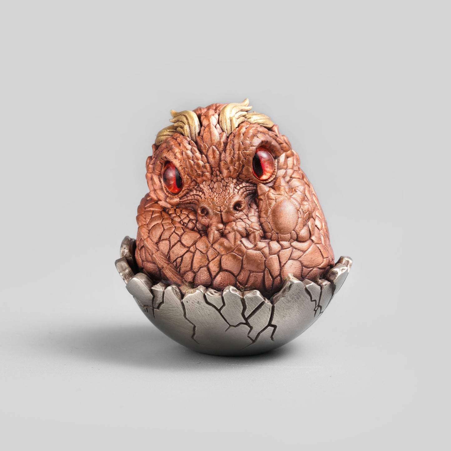 Bronze Baby Dinosaur Egg Sculpture