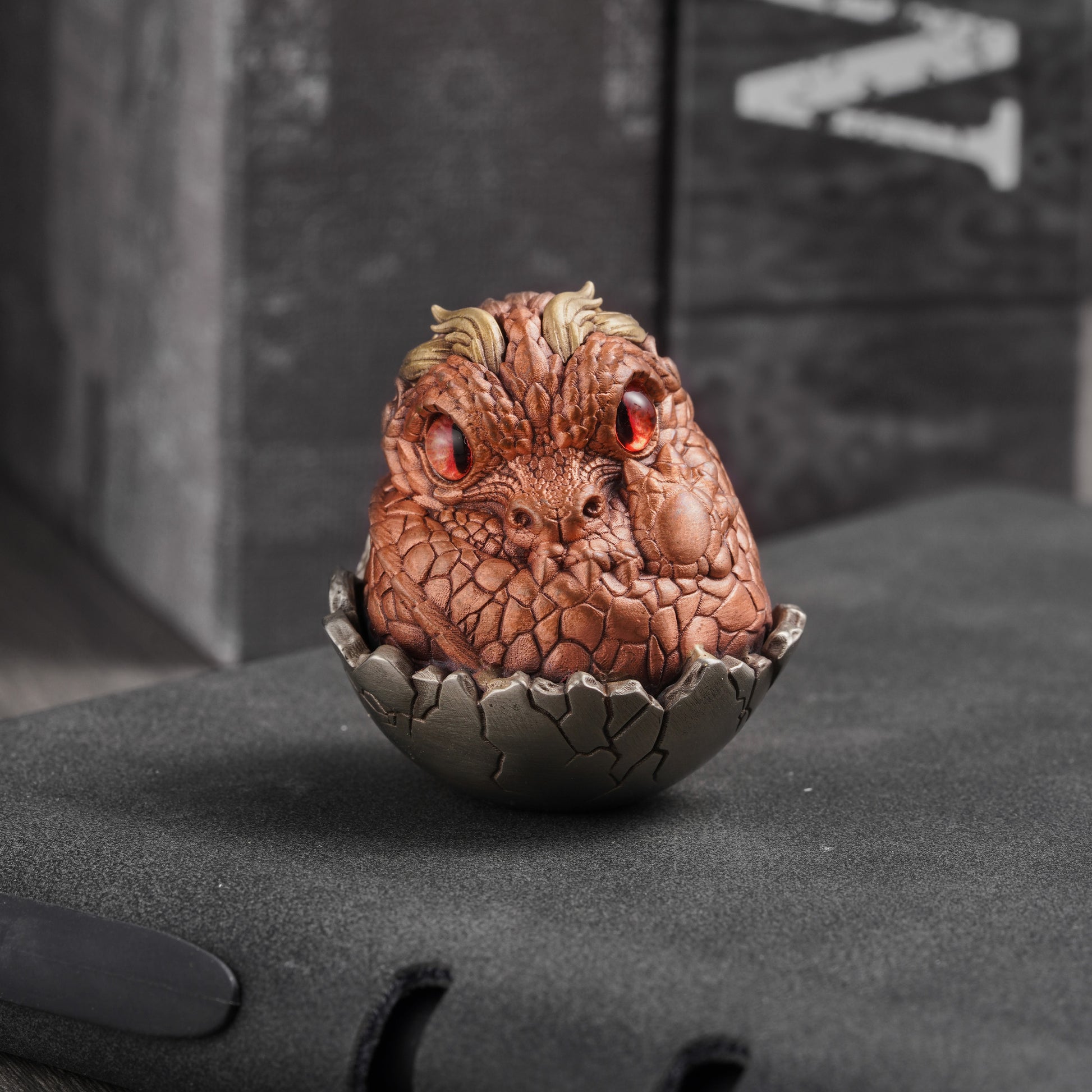 Bronze Baby Dinosaur Egg Figurine